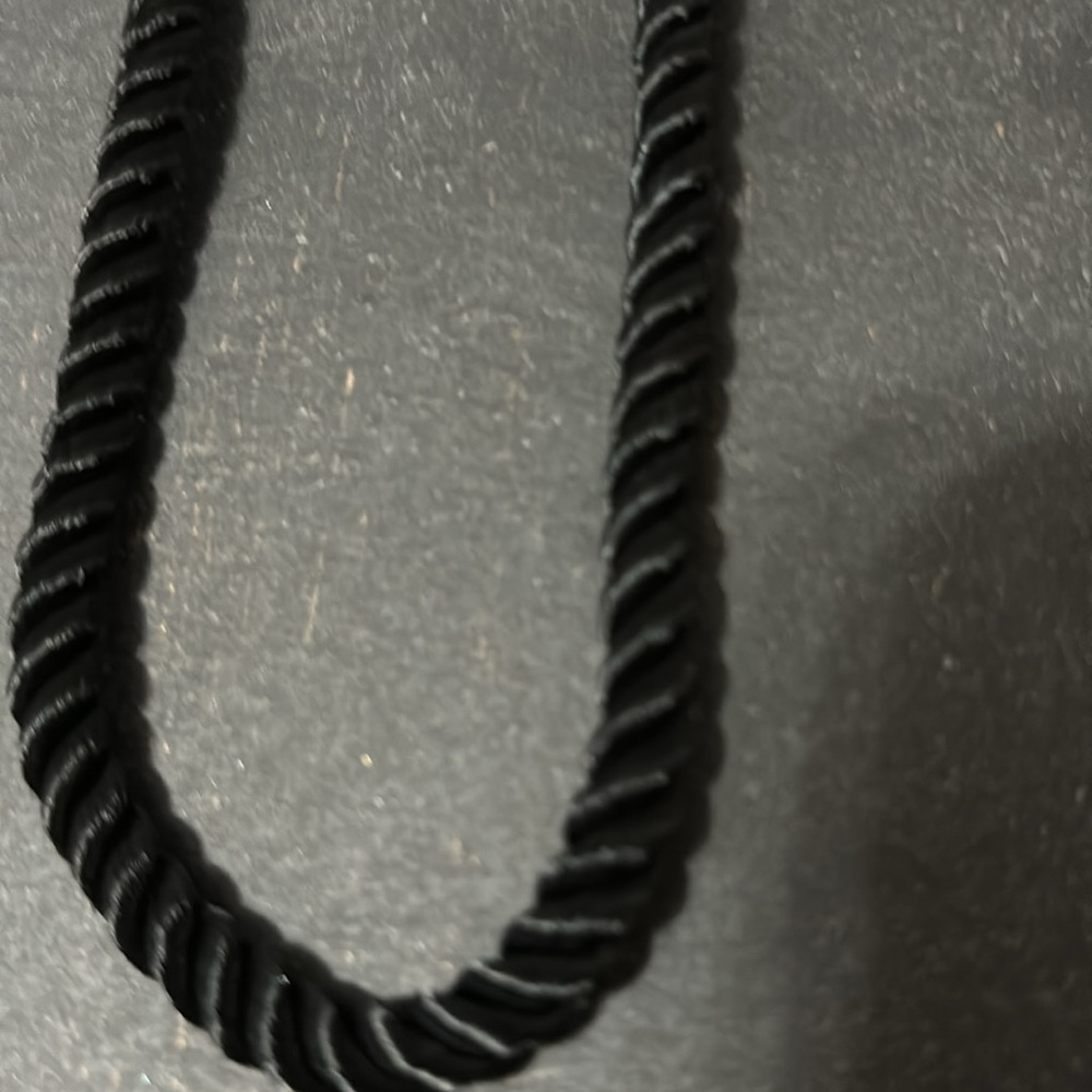 16 inch black silk cord necklace with gold tone medallion - Picture 2 of 5